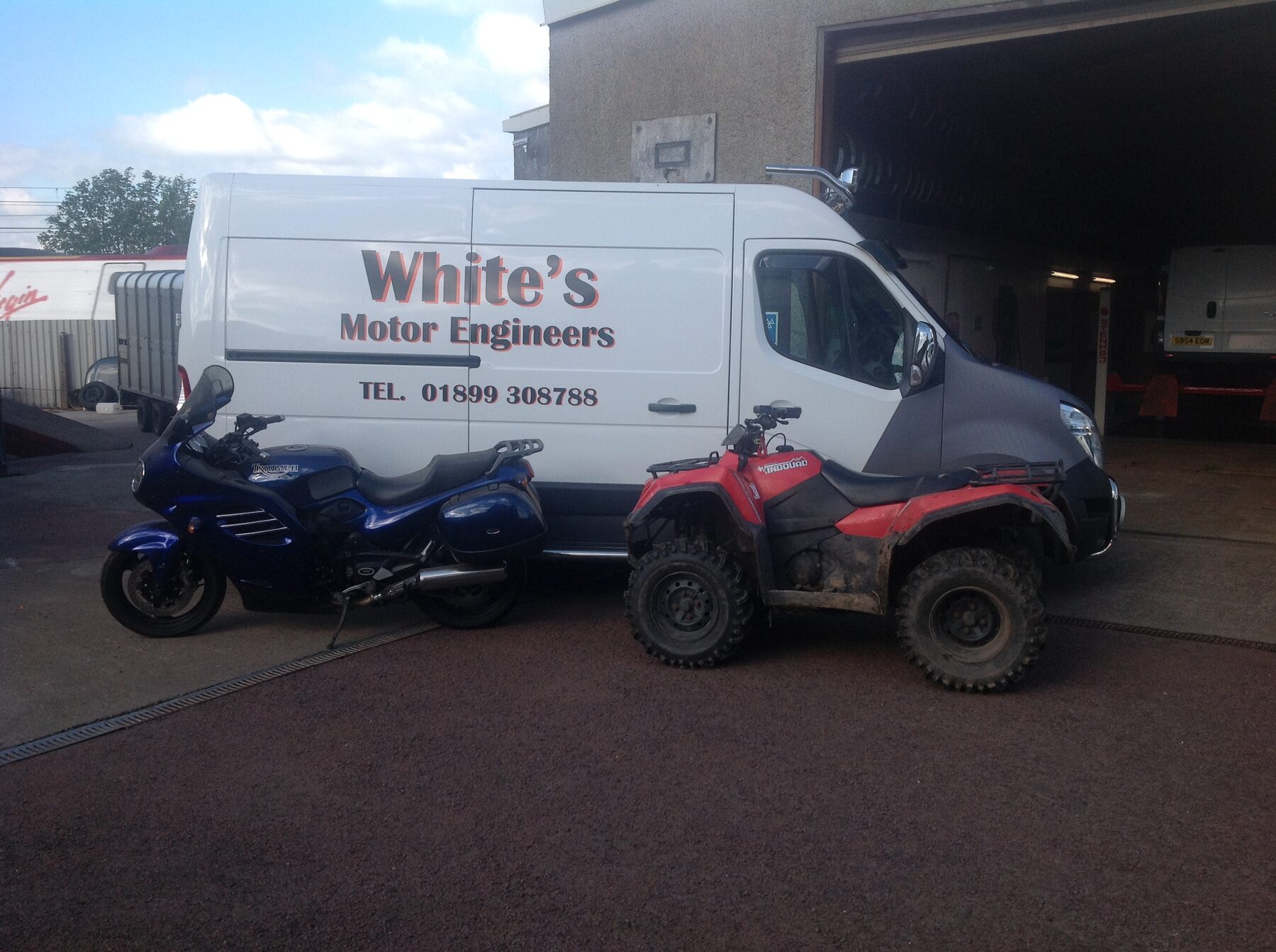 White's Motor Engineers van with a motorbike and quad outside the workshop